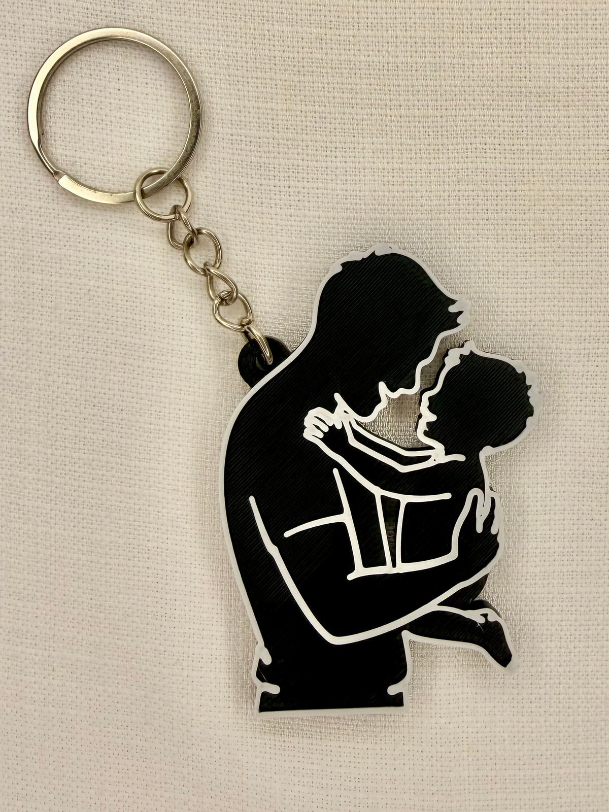 Dad & Child Hug Keyring – Black & White