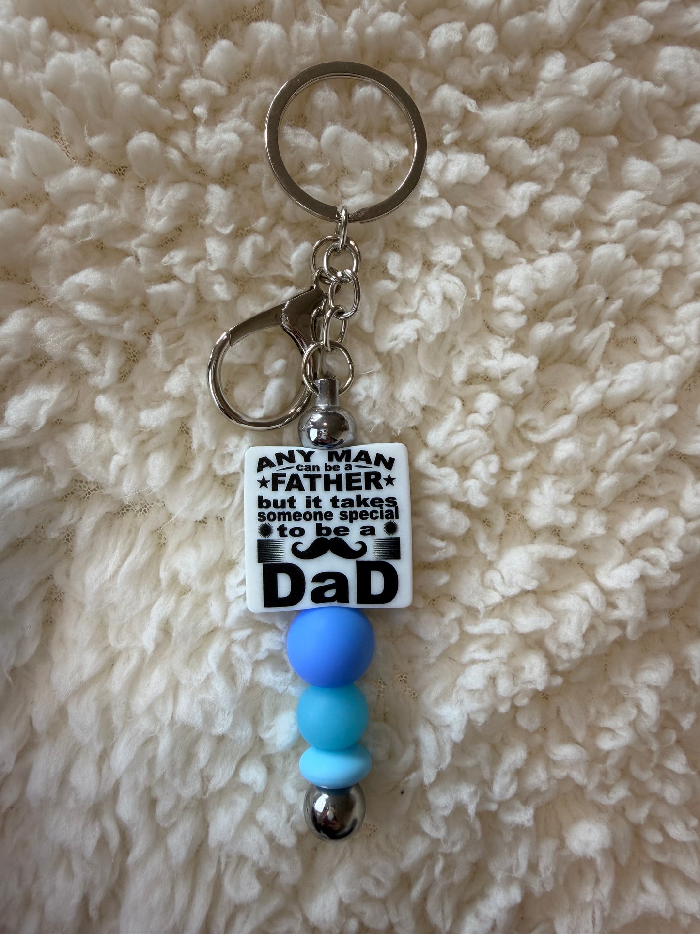Any Man Can Be a Father Keyring