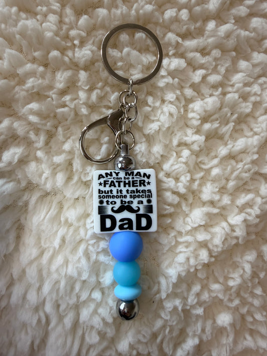Any Man Can Be a Father Keyring
